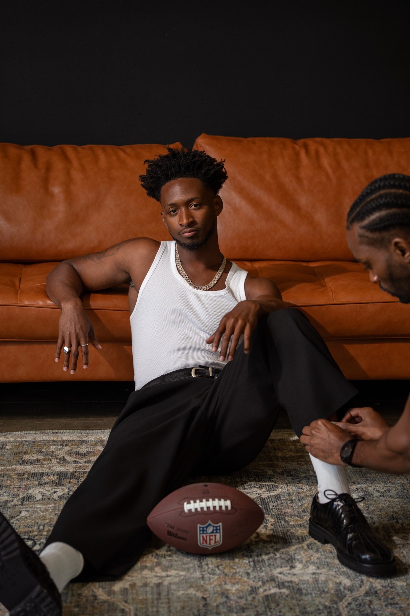 Editorial portrait with a football