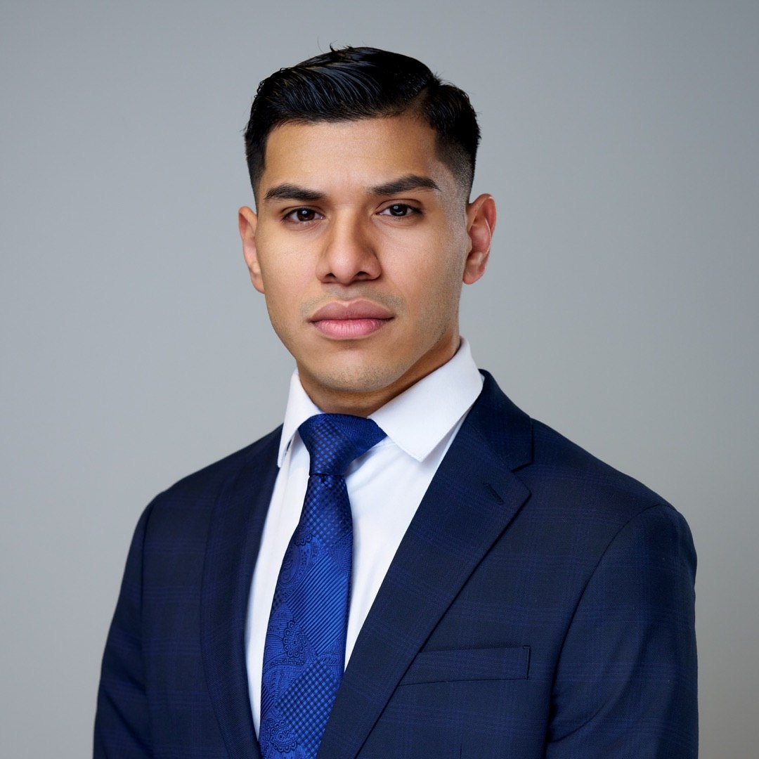 Professional headshot of a man